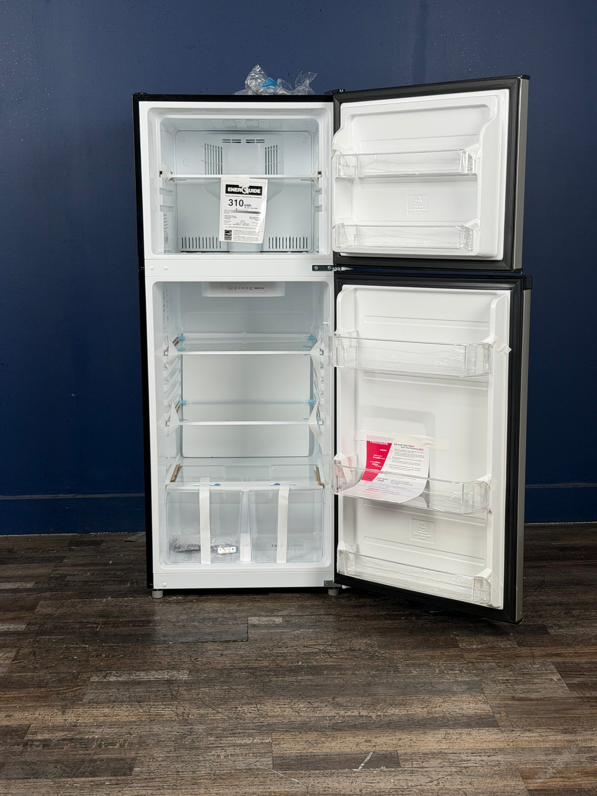Frigidaire - 24 in. 12 cu. ft. Counter Depth Garage Ready Top Freezer Refrigerator in Fingerprint Resistant Stainless Steel Look