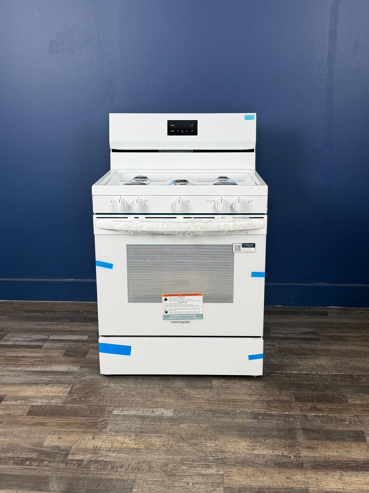 Frigidaire - 30 in 5 Burner Freestanding Gas Range in White with Quick Boil and Even Baking Technology
`