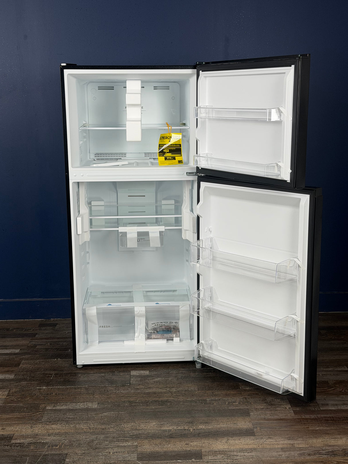 Frigidaire - 29.7 in 19 cu. ft. Standard Depth Garage Ready Top Freezer Refrigerator in Black w/ Humidity-Controlled Crisper Drawers