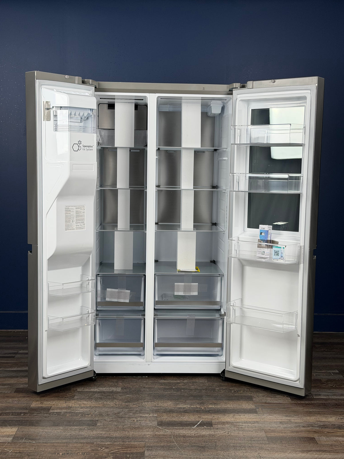 LG - 27 cu. ft. Side-By-Side Refrigerator with Instaview Glass, Craft Ice, and Recessed Handles in PrintProof Stainless Steel